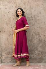 Rosewood Solid Wine Flared Kurta Set Paired With Solid Pant And Brown Net Embroider Dupatta