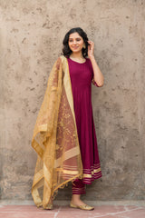 Rosewood Solid Wine Flared Kurta Set Paired With Solid Pant And Brown Net Embroider Dupatta