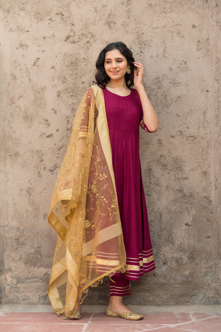 Rosewood Solid Wine Flared Kurta Set Paired With Solid Pant And Brown Net Embroider Dupatta