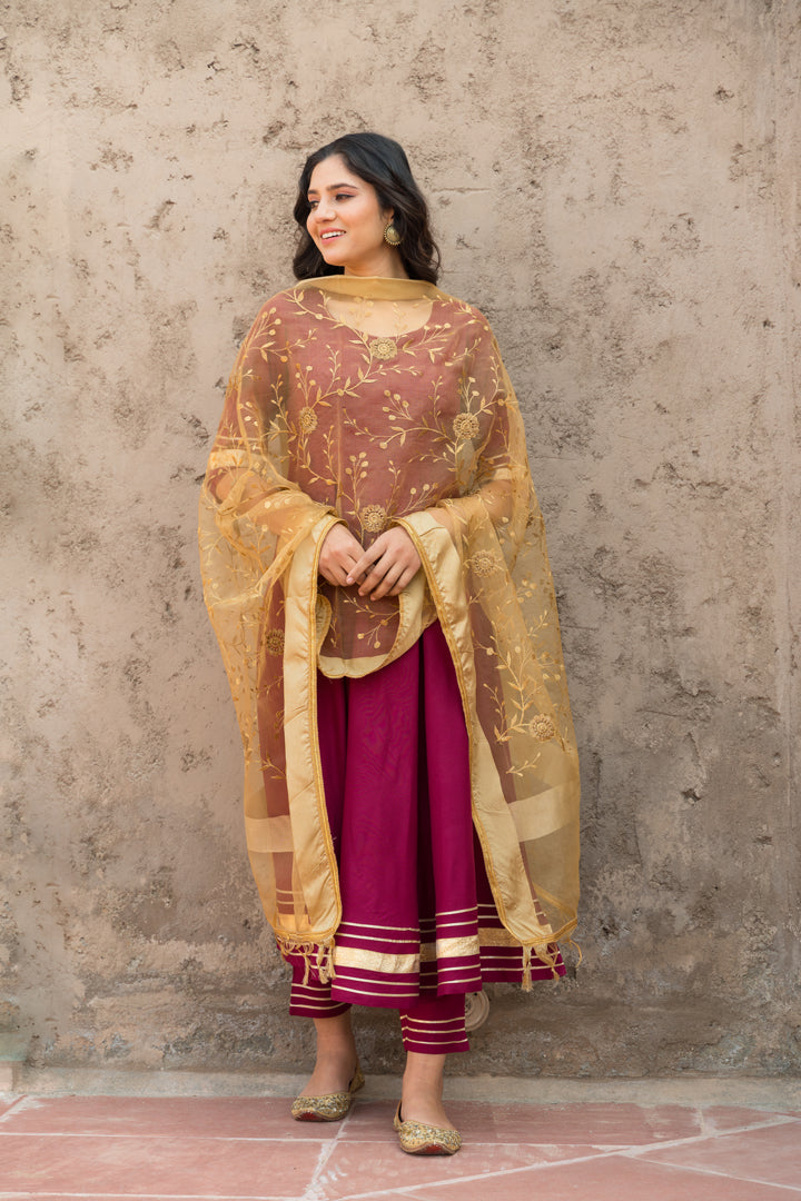 Rosewood Solid Wine Flared Kurta Set Paired With Solid Pant And Brown Net Embroider Dupatta